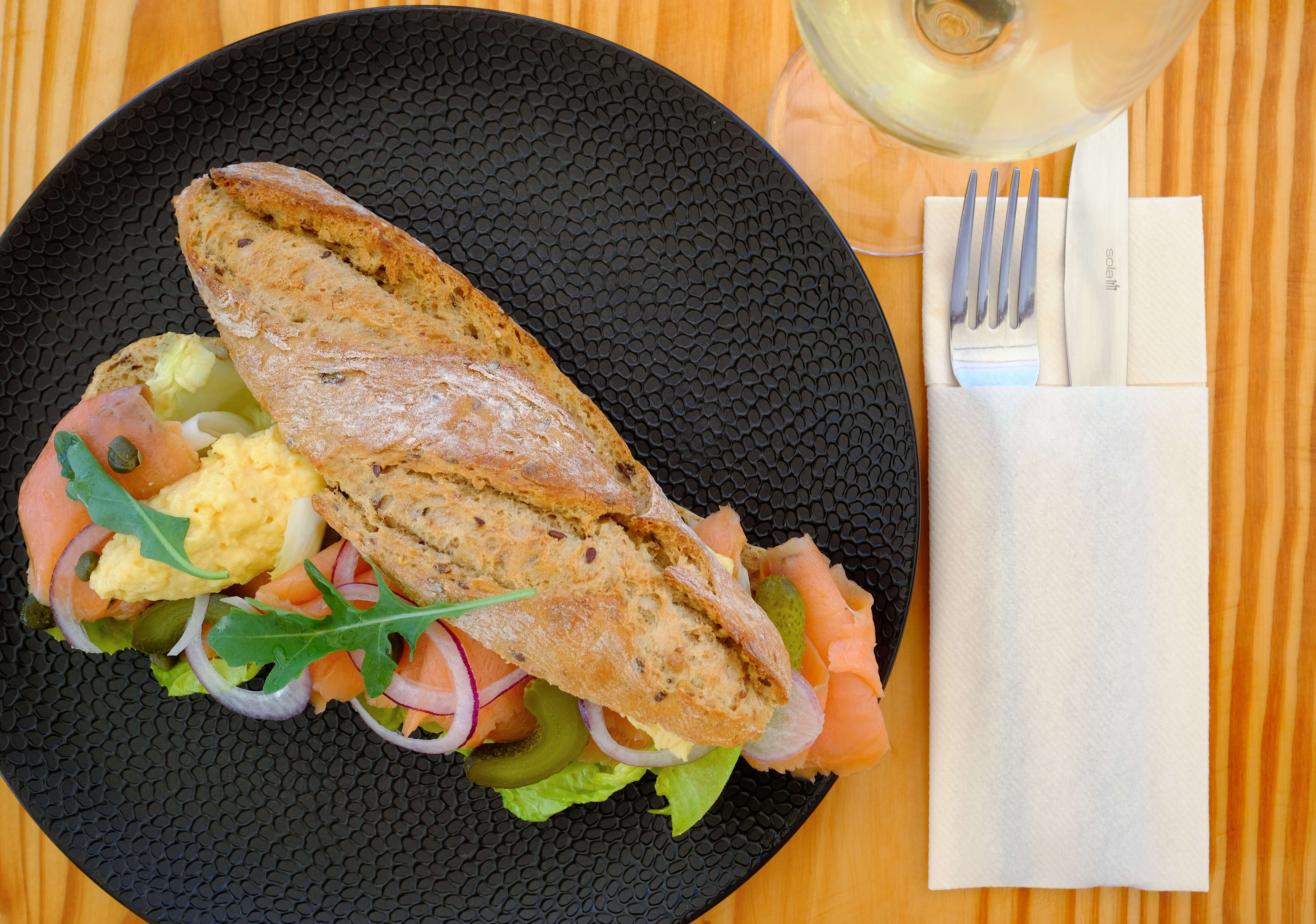 A baguette with salmon and vedgetables at Bari Restaurant